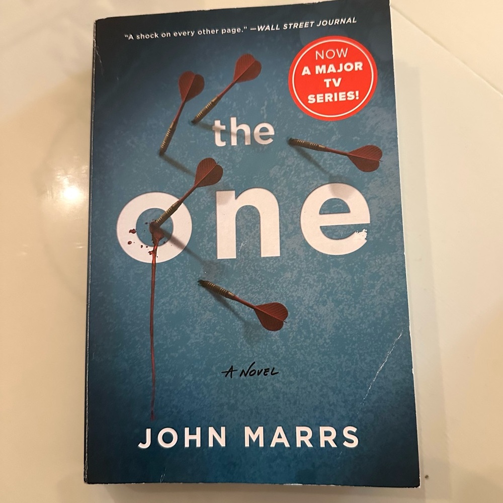 The One by John Marrs - Blue Cover Novel Book